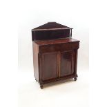 A Victorian mahogany chiffonier with raised shelf back,