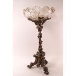 A Victorian table centre with cut glass bowl on a silver plated stand on three scroll feet, 54.