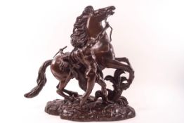 After Caustea, a bronze figure of a Marley horse and his handler,