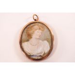 Early 20th century School, portrait miniature of a lady, watercolour on ivory,