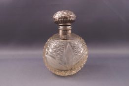 An Edwardian silver mounted cut glass scent bottle and stopper, hallmarked for Walker & Hall,