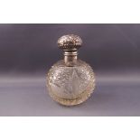 An Edwardian silver mounted cut glass scent bottle and stopper, hallmarked for Walker & Hall,