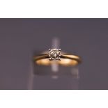 A 9ct gold diamond solitaire ring, 0.2ct diamond, size M. 2.