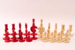 A late 19th century stained bone chess set, the King 6.