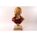 An early 19th century Staffordshire pottery bust of the Virgin Mary,