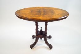 A Victorian walnut oval occasional table,