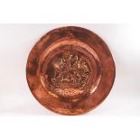 A circular copper wall plate, hammered in relief with a ship in full sail, marked 'T H', 36.