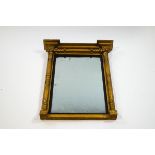 A Regency rectangular giltwood wall mirror, with column mounts,