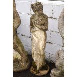 A large garden re-constituted stone sculpture of a classical lady,