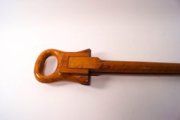 A ladies fruitwood shooting stick,