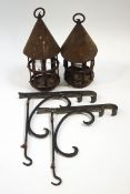 A pair of French iron chateau dungeon lanterns with brackets