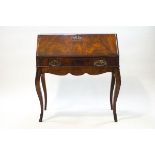 A 19th century walnut ladies writing desk in the Louis XVI style,