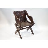 An oak Glastonbury chair,