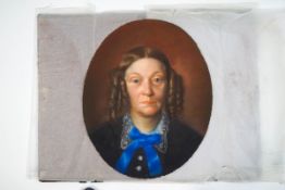 Victorian School, oval portrait of a lady wearing a blue ribbon bow, pastel,