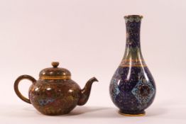 A Cloisonne teapot and cover with overall decoration,