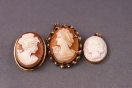 A collection of three cameo items to include two brooches and one pendant,