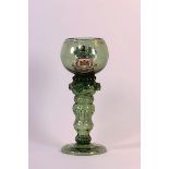 A German green glass Goblet, probably by Fritz Hickert, 1866-1923,