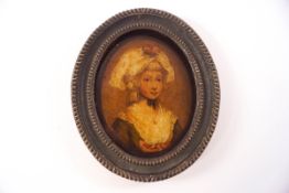 A late 18th century oval miniature portrait on glass, circa 1800,