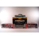 Four boxed 1:18 scale model cars, An Auto World 1957 Chrysler 300C and a 1937 Cord 812 convertible,