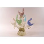 A Murano coloured glass table centrepiece in the form of five stylised swans on branches,