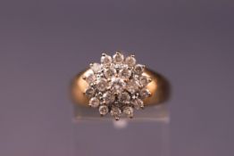 A 9ct gold diamond cluster ring, 1.1ct diamond. 4.