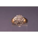 A 9ct gold diamond cluster ring, 1.1ct diamond. 4.