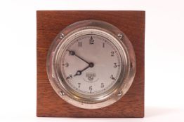 A 1920's/30's Smiths car clock, 8 day, within an oak mount,12.