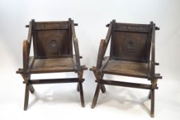 A pair of oak Glastonbury chairs,
