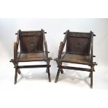 A pair of oak Glastonbury chairs,