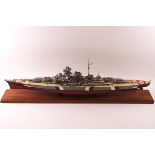 A late 20th century kit model of the Bismarck, on rectangular mahogany plinth,