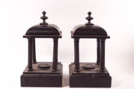 A pair of Victorian slate pagodas, each supported by columns,
