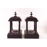 A pair of Victorian slate pagodas, each supported by columns,