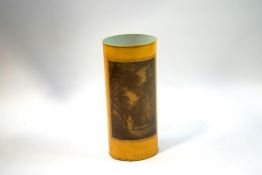 A tole cylindrical umbrella stand each side applied with a print on yellow ground,