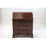 A George III mahogany bureau,