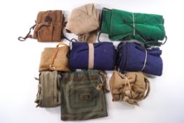 Seven various fishing rod bags, a fishing priest,