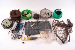 A box of reels and other assorted fishing tackle