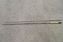 A 7-8 fly fishing trout rod, 9'6", together with a collection of flies,