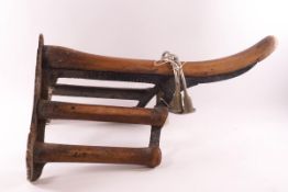 An early 20th century saddle horse and a pair of stirrups