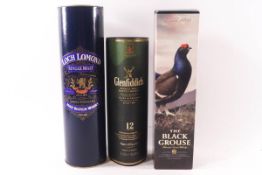 Three bottles of whisky : The Black Grouse,