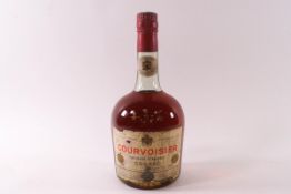 A Vintage bottle of three wine Courvoisier Cognac