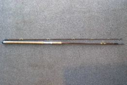 A Hardy 9'1/2" fibreglass spinning two piece rod