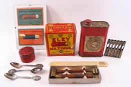 A collection of vintage shooting items,