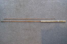 A two piece split cane rod and bag