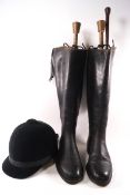 A pair of leather riding boots, size 9,