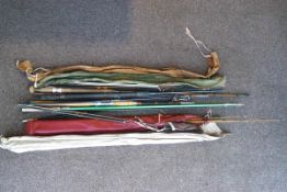 Assorted rods, some in cases,