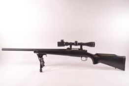 An ASGK model 700 air rifle with scope and slip