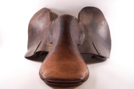 A leather jumping saddle