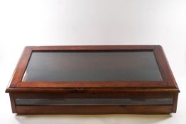 A stained pine table top display case,