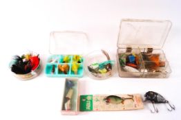 A bait box of assorted lures and spoons