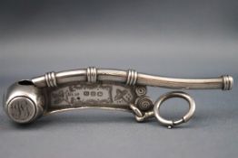 A Victorian silver boatswains whistle, with engraved decoration by Hilliard & Thomason,